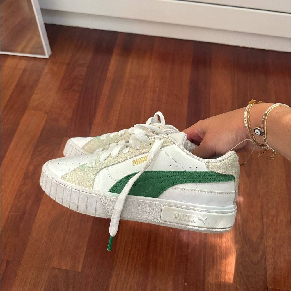 Green suede Puma sneakers